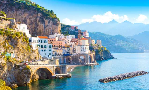 Morning view of Amalfi cityscape on coast line of mediterranean sea, Italy