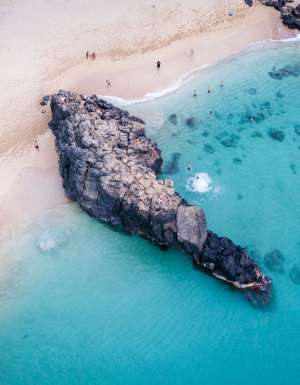 Cliff jumping in Waimea Bay Oahu Hawaii