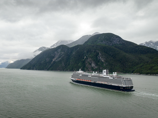 A Holland America Cruise ship sailing through Koningsdam