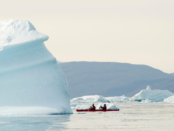 Two people kayaking in Arctic Greenland