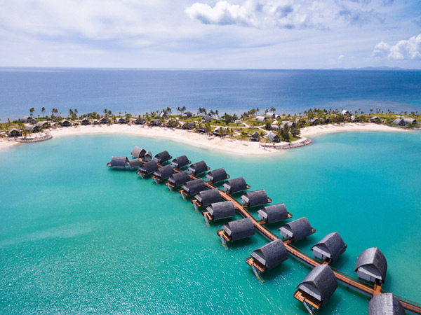 Aerial view of the over-water bungalows at the Fiji Marriott Resort Momi Bay