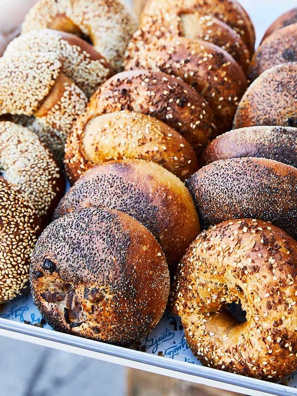 a pile of Gjusta bagels