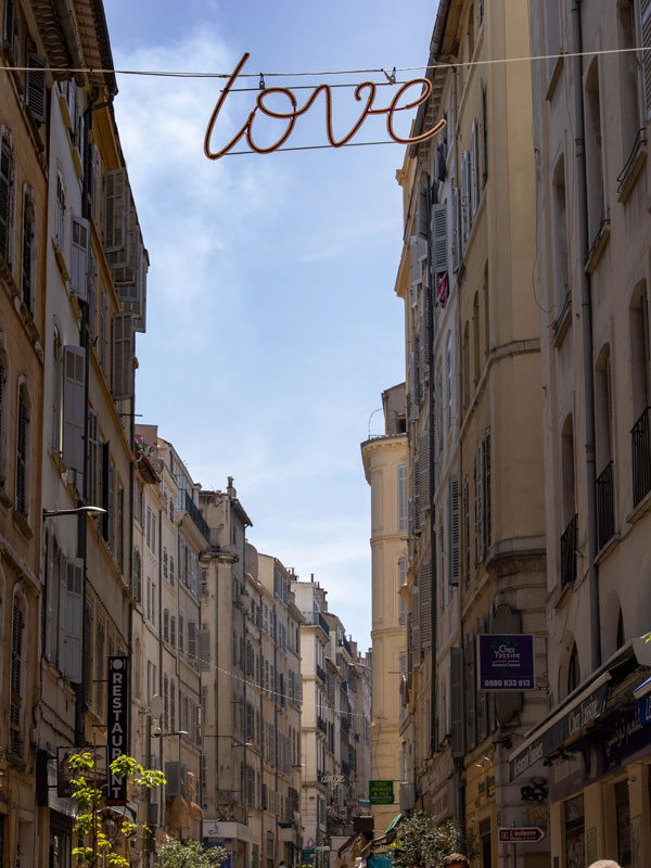 people strolling along the streets of Marseille