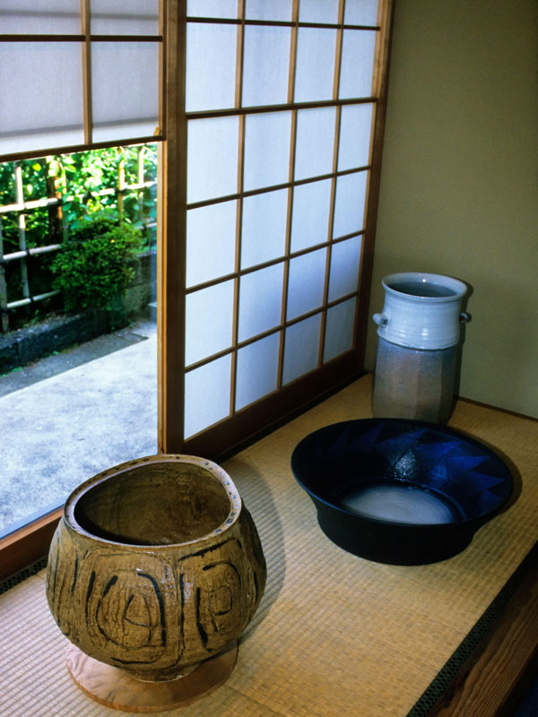 traditional pots displayed in a Japanese home