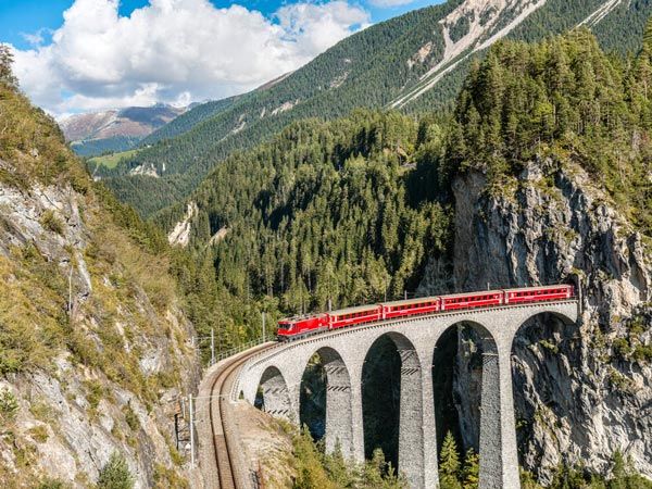 a train crosses the Landwasser Viaduct