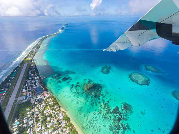 an aerial view of Funafuti atoll and the airstrip of International airport in Vaiaku