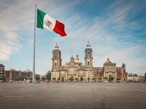 view of the Zócalo main square with flag in Mexico