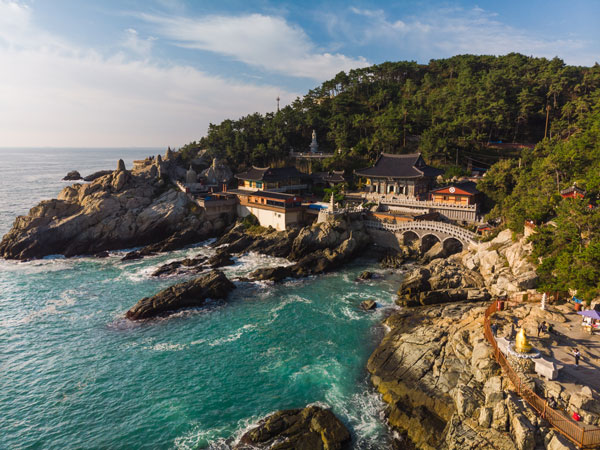 Haedong Yonggungsa Temple perched on a cliff by the side of the ocean