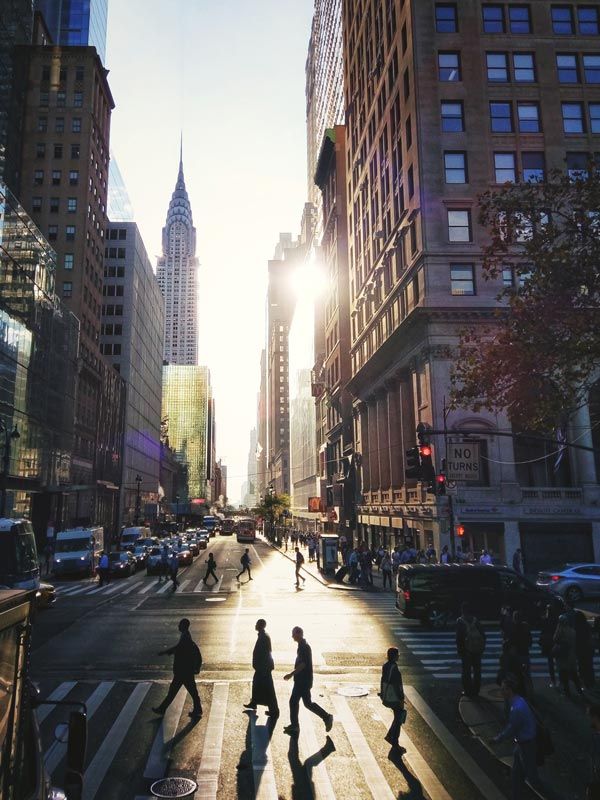 people walking in East 42th street in Manhattan early morning