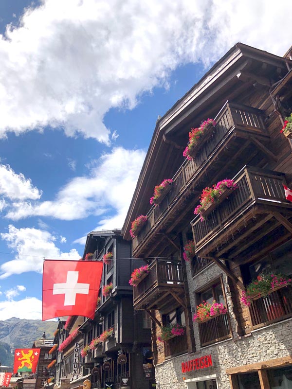 a building in Zermatt on a sunny day