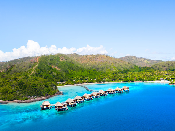 an aerial view of Likuliku Lagoon Resort with floating villas