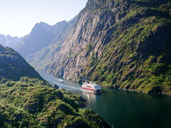 Ship sailing through the fjords at Trollfjord