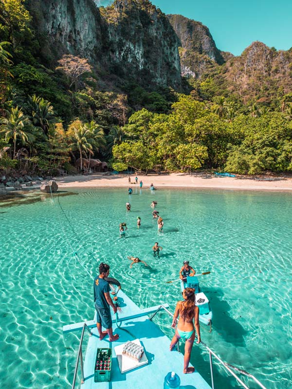 a group of tourists touching down Cadlao Island in El Nido, Palawan
