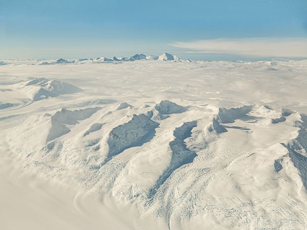 an aerial view of the ice glaciers in South Pole
