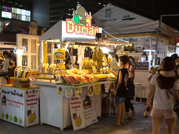 a durian fruit stall at Jodd Fairs night market