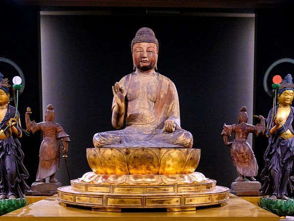 a Buddhist statue at an art exhibition in Fukuoka Art Museum