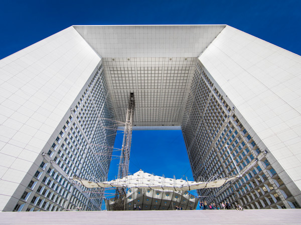 the towering structure of Grande Arche de La Défense in Paris