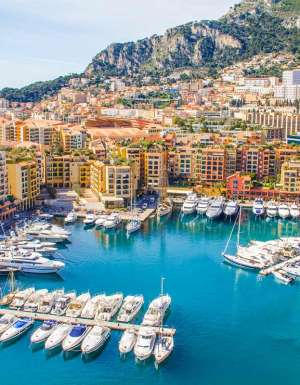 an aerial view of boats docked at the Fontvieille district in Monaco