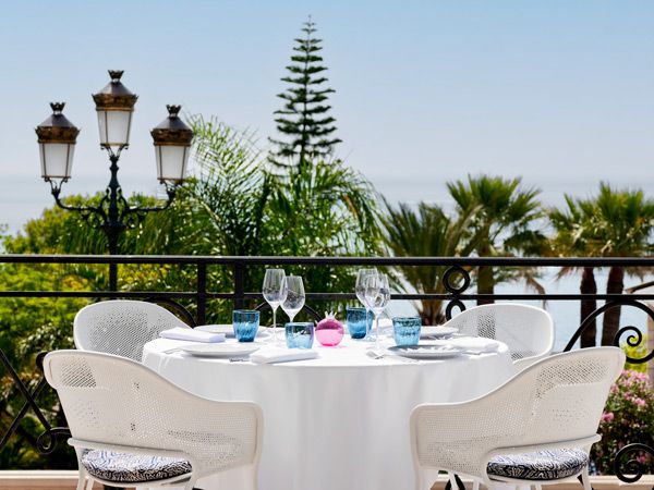 an al fresco dining setup at Lebanese restaurant Em Sherif in Hôtel de Paris