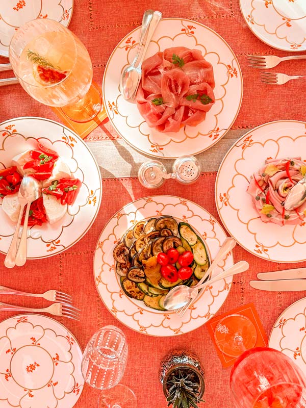 a table top view of Italian antipasti and cocktails at Grand Hotel Tremezzo’s T Bar