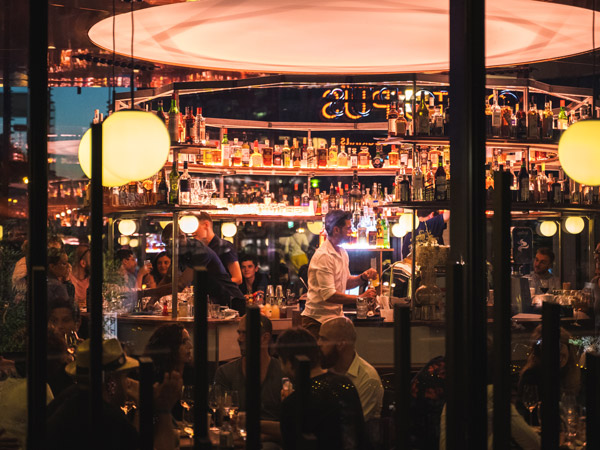 a crowded bar inside Octopus Paris