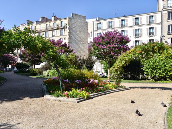 a serene landscape with buildings at Place d’Italie in Paris