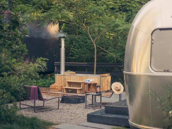 an al fresco seating area at Guerneville AutoCamp Redwood Suite