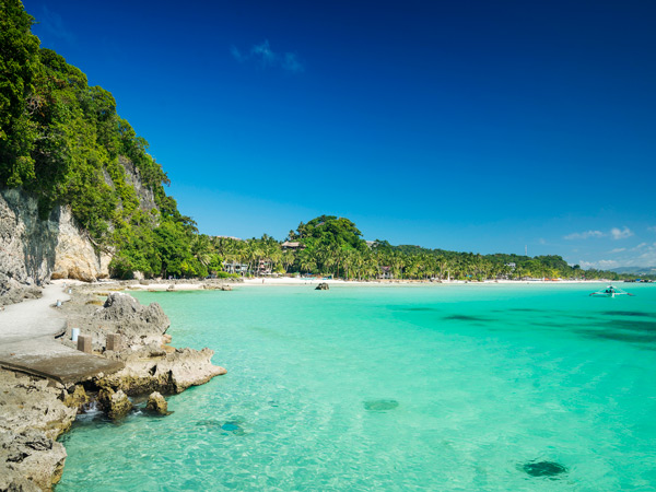a cliffside path leading to Diniwid Beach