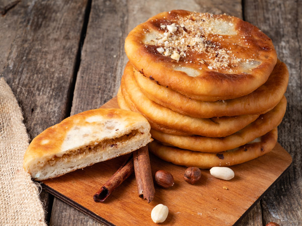 a close-up photo of round-shaped pastries known as Hotteok