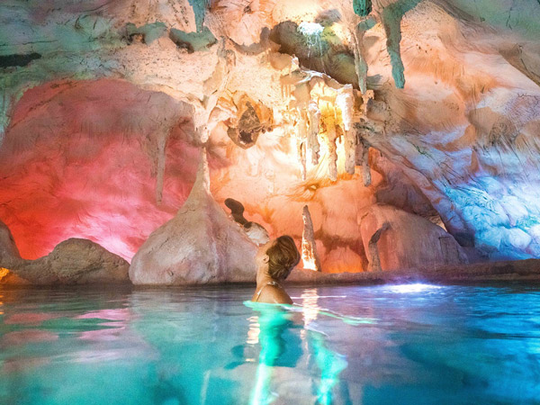 a woman soaking in The Lost Spring NZ