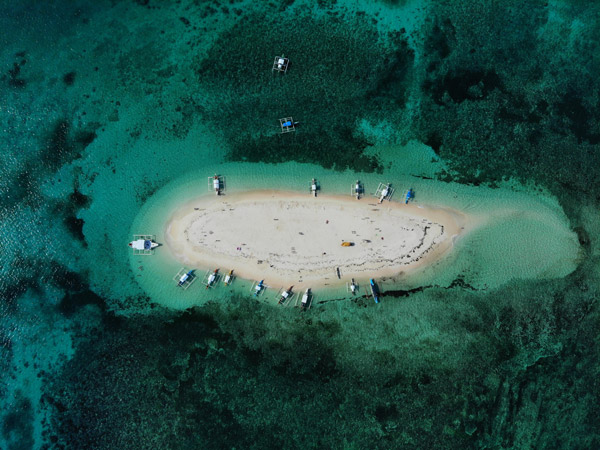 an aerial view of Naked Island Siargao, Philippines
