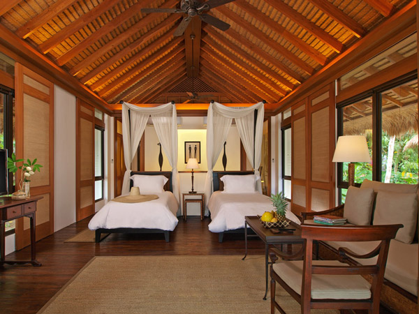 a rustic bedroom interior at Pangulasian Island in El Nido, Palawan