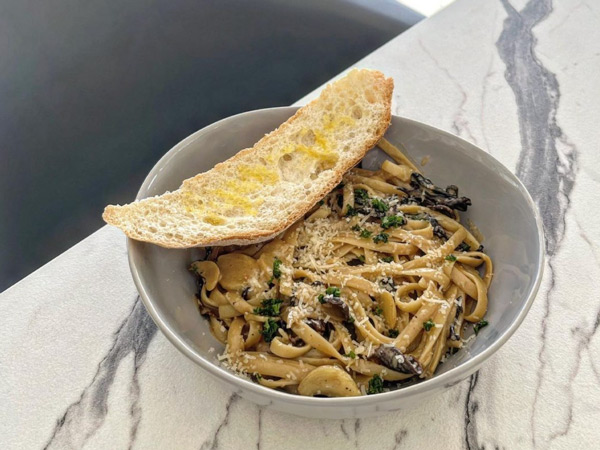 a bowl of Sagada Mushroom Cream Pasta at Sunny Side Cafe, Boracay