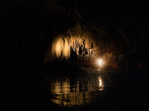 a source of light inside the cave at Puerto Princesa Underground River