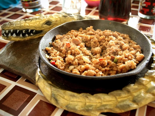 a plate of Crocodile Sisig