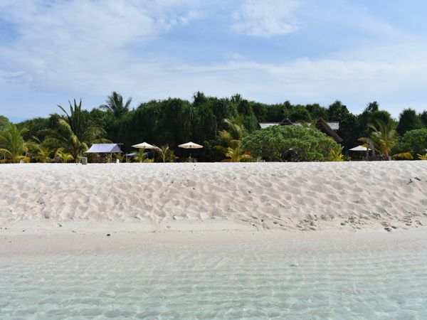 a white-sand beach at Tangkahan Island, Balabac, Palawan, Philippines