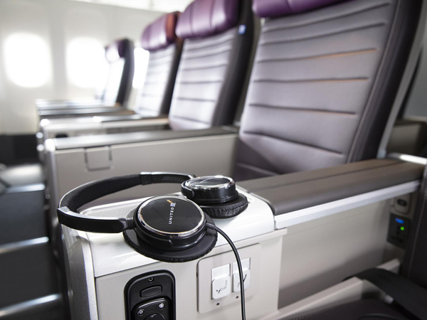 noise-reducing headphones at United Airlines’ Premium Plus
