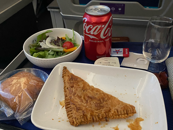 a welcome meal at United Airlines’ Premium Plus