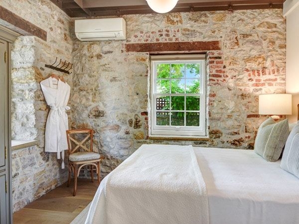 a country-style bedroom interior at Bungalows 313