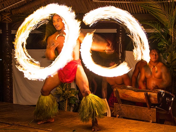 fa’ataupati dancer at Fiafia night, Samoa