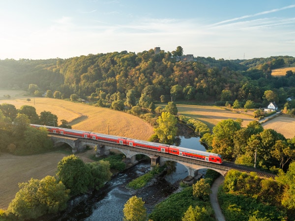 an aerial shot of the train travelling across Europe