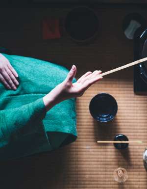 a tea ceremony at Camelia Garden