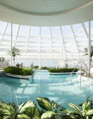 an indoor pool onboard Royal Caribbean Quantum of the Seas
