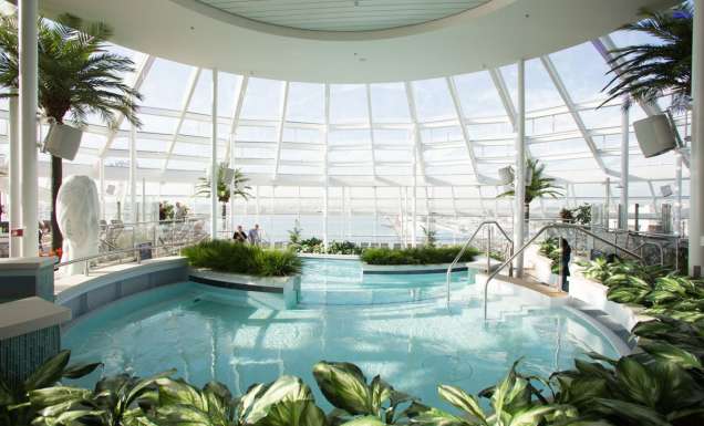 an indoor pool onboard Royal Caribbean Quantum of the Seas