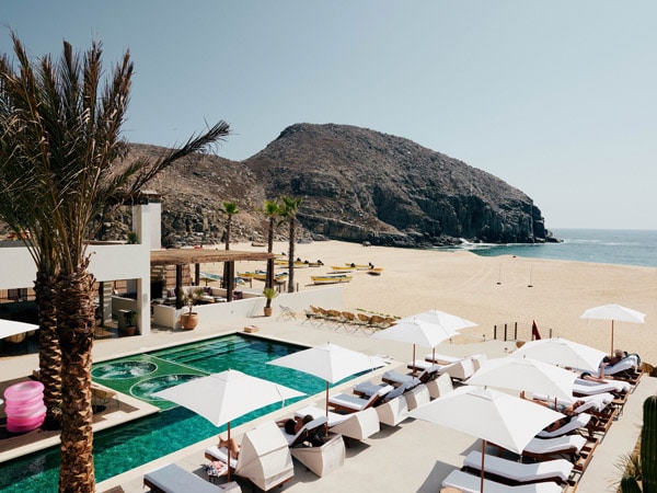 an overhead shot of the pool with sun loungers on the beach at Hotel San Cristóbal, Mexico