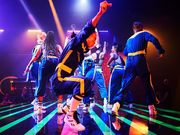 a dance party in the red room onboard Virgin Voyages’ Resilient Lady