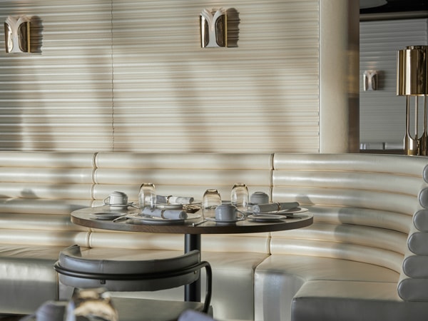 a sophisticated interior at The Wake, Virgin Voyages’ Resilient Lady
