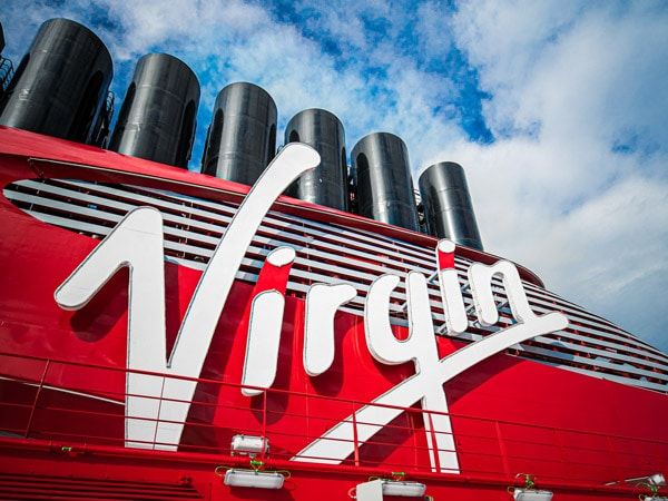 the logo of Virgin Voyages’ Resilient Lady