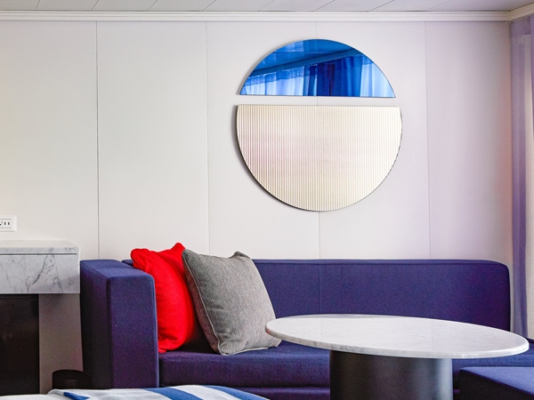 the living room inside brilliant suite, Virgin Voyages’ Resilient Lady