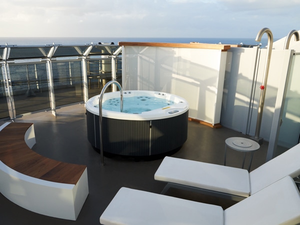 a jacuzzi at the massive suite, Virgin Voyages’ Resilient Lady